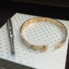 0.42 Cts Round Brilliant F/VS1 Diamonds Unisex Love Screw Bracelet In Certified 14K Rose Gold