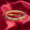 Classy 0.42 Cts Round Brilliant F/VS1 Diamonds Unisex Love Screw Bracelet 14K Yellow Gold