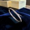 B-136-W (18) 1.51 Cts Round Brilliant F/VS1 Diamonds Unisex Love Screw Bracelet in 14K White Gold