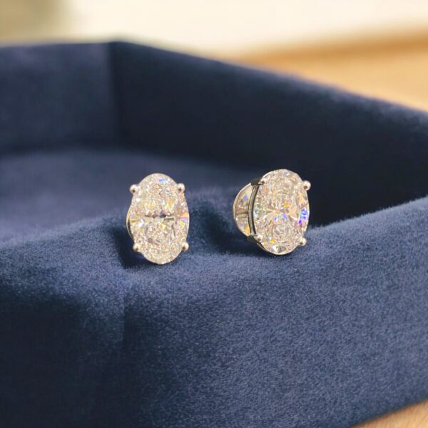 GIA Certified 4 Carats Oval Shape F/VS1 Diamonds Stud Earrings In 18K White Gold