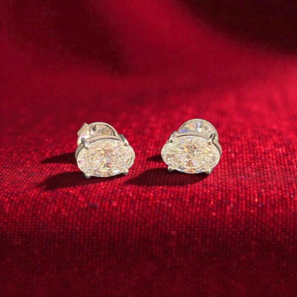 GIA Certified 4 Carats Oval Shape F/VS1 Diamonds Stud Earrings In 18K White Gold
