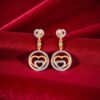 0.92 Cts Round Brilliant F/VS1 Diamonds Double Heart Dangle Earrings In 14K Gold