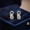 Stunning 0.30 Cts Round Brilliant F/VS1 Diamonds Infinity Stud Earrings 18K Gold