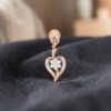 Classy 0.66 Cts Round Brilliant F/VS1 Diamonds Heart Dangle Earrings In 14K Gold