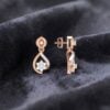 Classy 0.68 Cts Round Brilliant F/VS1 Diamonds Dangle Earrings In 14K Rose Gold
