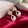 Classy 0.68 Cts Round Brilliant F/VS1 Diamonds Dangle Earrings In 14K Rose Gold