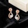 Classy 0.68 Cts Round Brilliant F/VS1 Diamonds Dangle Earrings In 14K Rose Gold