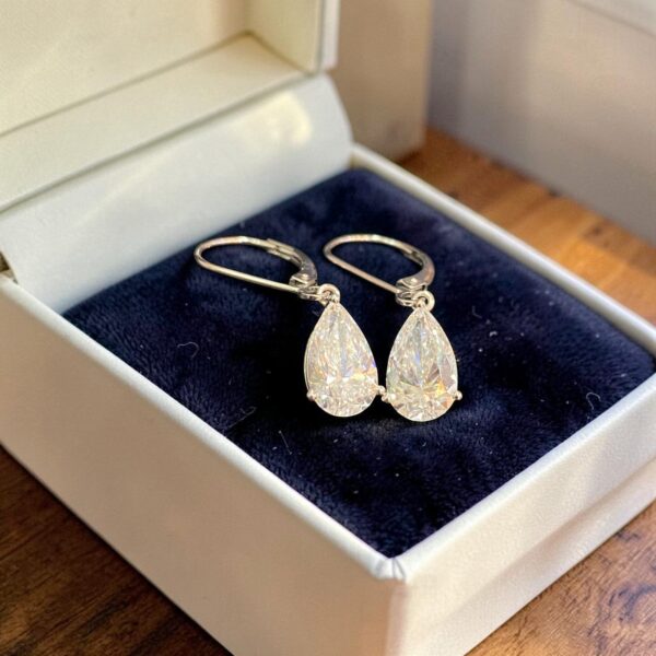 GIA Certified 4 Cts Pear Shape F/VS1 Diamonds Dangle Earrings In 18K White Gold