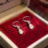 GIA Certified 1 Cts F/VS1 Pear Shape Diamonds Dangle Earrings In 18K White Gold