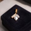 Stunning 0.60 Cts Round Baguette Shape F/VS1 Diamonds Pendant In 14K Yellow Gold