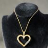 0.30 Cts Round Brilliant F/VS1 Diamonds Open Heart Pendant In 14K Gold