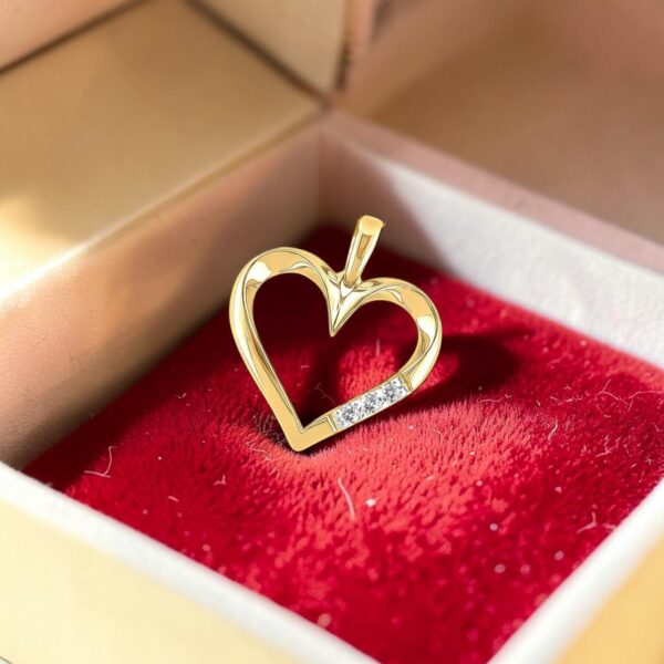 0.30 Cts Round Brilliant F/VS1 Diamonds Open Heart Pendant In 14K Gold