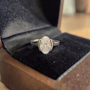 GIA Certified 2.50 Cts Oval Shape F/VS1 Diamond Half Bezel Set Ring In 18K Gold