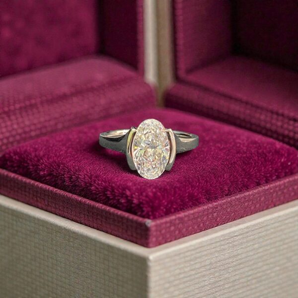 GIA Certified 2.50 Cts Oval Shape F/VS1 Diamond Half Bezel Set Ring In 18K Gold