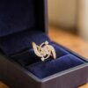 0.56 Cts Round Brilliant F/VS1 Diamonds Floral Engagement Ring In 14K Rose Gold