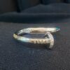 0.22 Cts Round Brilliant Cut Diamonds Juste Un Clou Unisex Nail Ring In 18K Gold